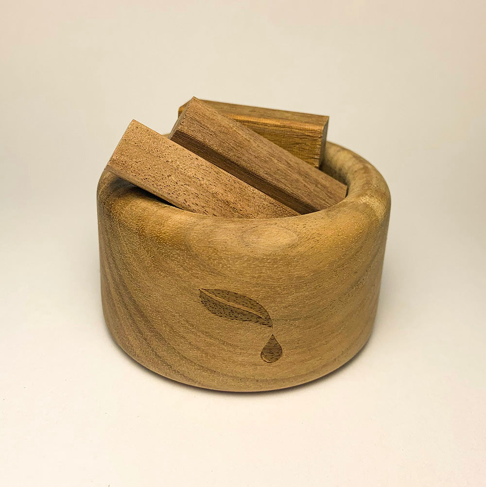 Black walnut wood diffuser close-up - natural essential oil aromatherapy cup