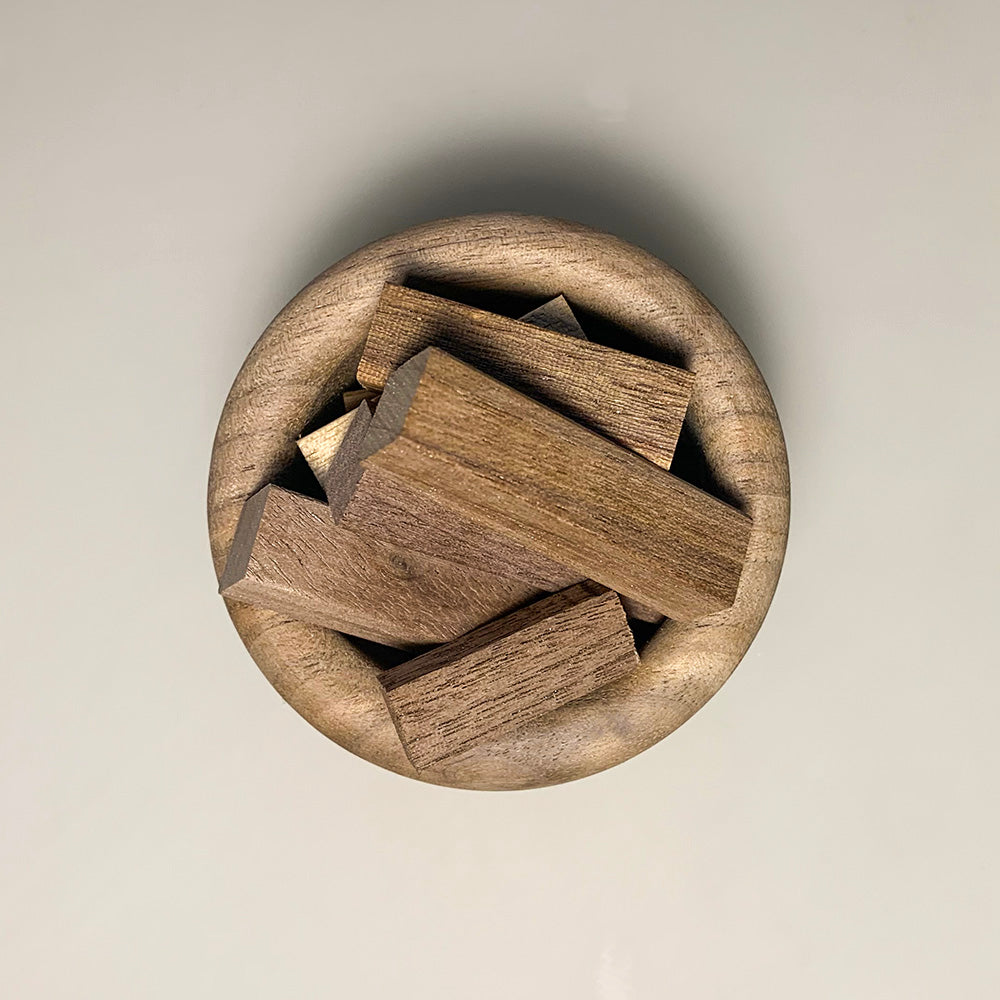 Black walnut essential oil diffuser top view showing natural wood grain texture